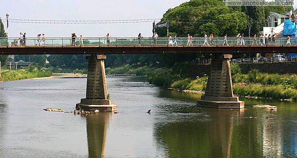 Uzhgorod. Pedestrian bridge over river Uzh Zakarpattia Region Ukraine photos