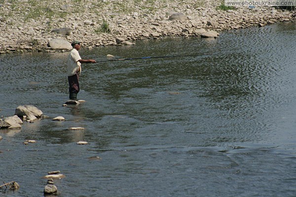 Uzhgorod. Catching small fish Zakarpattia Region Ukraine photos