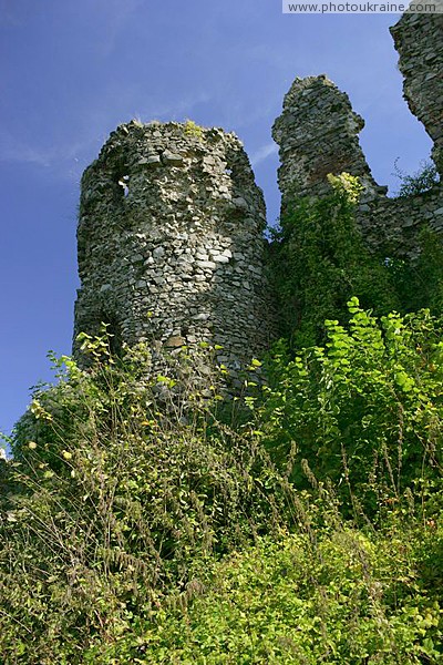 Hust. Partially surviving tower of castle Hust Zakarpattia Region Ukraine photos