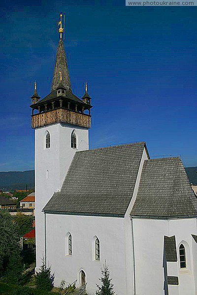 Hust. Church of Saint Elizabeth is covered with shingle Zakarpattia Region Ukraine photos