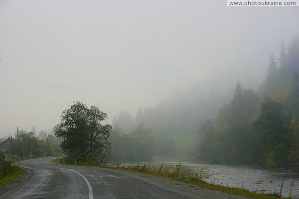 Kostylivka. Morning mist over Tisa Zakarpattia Region Ukraine photos