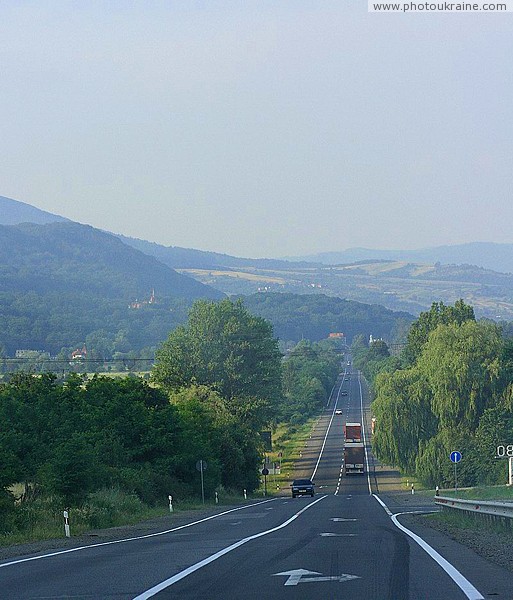 E50 road in suburb of Mukacheve heads for hills Zakarpattia Region Ukraine photos