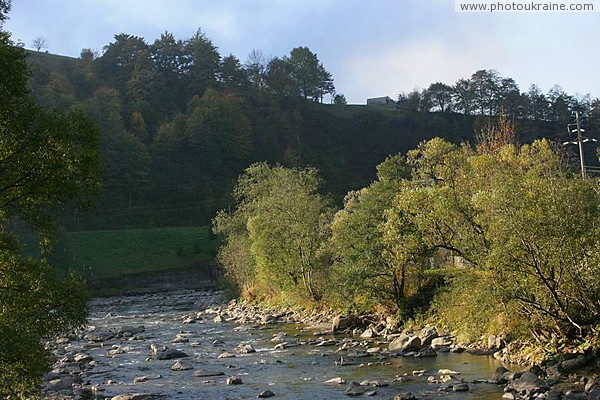 Rocky river bed waiting for rainy Tisa in mountains Zakarpattia Region Ukraine photos