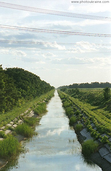 Irrigation canal at road Pryshyb  Dniprorudne Zaporizhzhia Region Ukraine photos