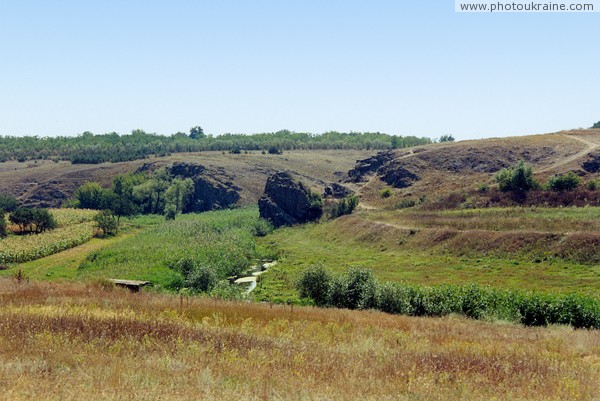 Mykolaivka. High rock above bed of river Berda Zaporizhzhia Region Ukraine photos