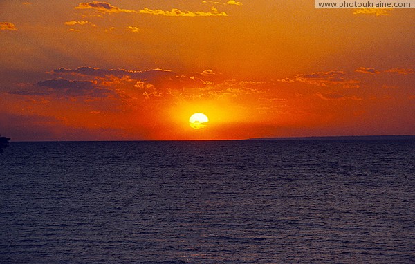 Skelky. Bloody sunset over Kakhovka reservoir Zaporizhzhia Region Ukraine photos