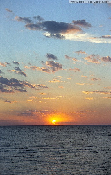 Skelky. Sunset over large reservoirs of country Zaporizhzhia Region Ukraine photos