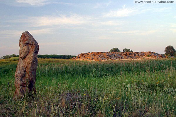 Terpinnia. Lyrical Landscape Stone Grave Zaporizhzhia Region Ukraine photos