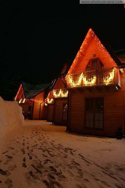 Bukovel. Illuminated balconies and pedestals of cottages Ivano-Frankivsk Region Ukraine photos