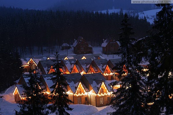 Bukovel. Lighted garlands cottage town Ivano-Frankivsk Region Ukraine photos