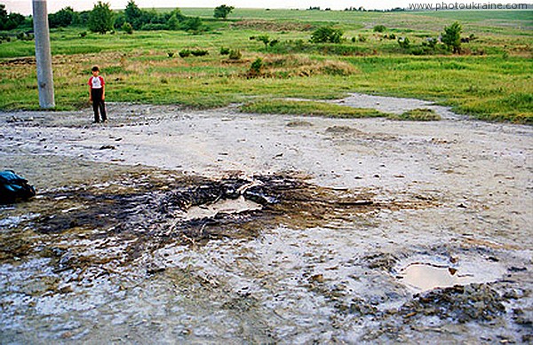 Starunia. Two craters of active clay volcano Ivano-Frankivsk Region Ukraine photos