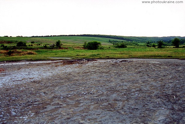 Starunia. Wide cone (3 m height) of a clay volcano Ivano-Frankivsk Region Ukraine photos