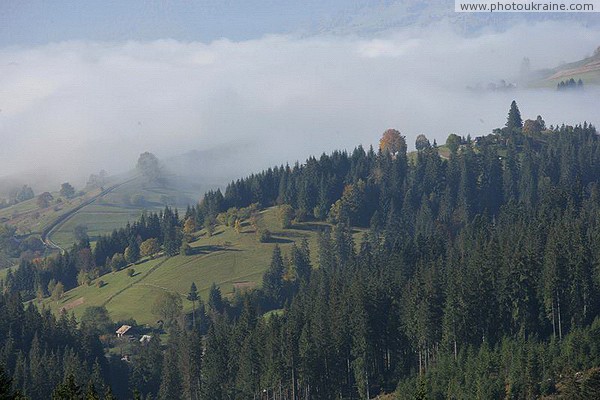 Yablunytskyi pass. Clouded mountain hills Ivano-Frankivsk Region Ukraine photos