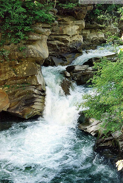 Yaremche. Waterfall Yaremchensky Huk in the headwaters of the Prut River Ivano-Frankivsk Region Ukraine photos