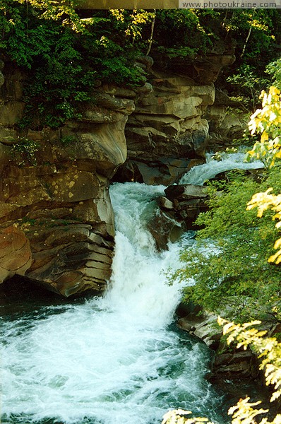 Yaremche. Turbulent stream of water falls Yaremche Ivano-Frankivsk Region Ukraine photos