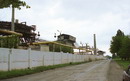Amvrosiivka. Long fence of cement plant, Donetsk Region, Towns 