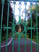 Turchynivka. Through bars of front gate of estate, Zhytomyr Region, Country Estates 