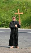 Barefoot pilgrim on road at Mount Grey Kichera, Zakarpattia Region, Peoples 