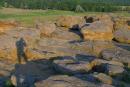 Terpinnia. Stone Grave and shadow of photographer, Zaporizhzhia Region, Geological sightseeing 